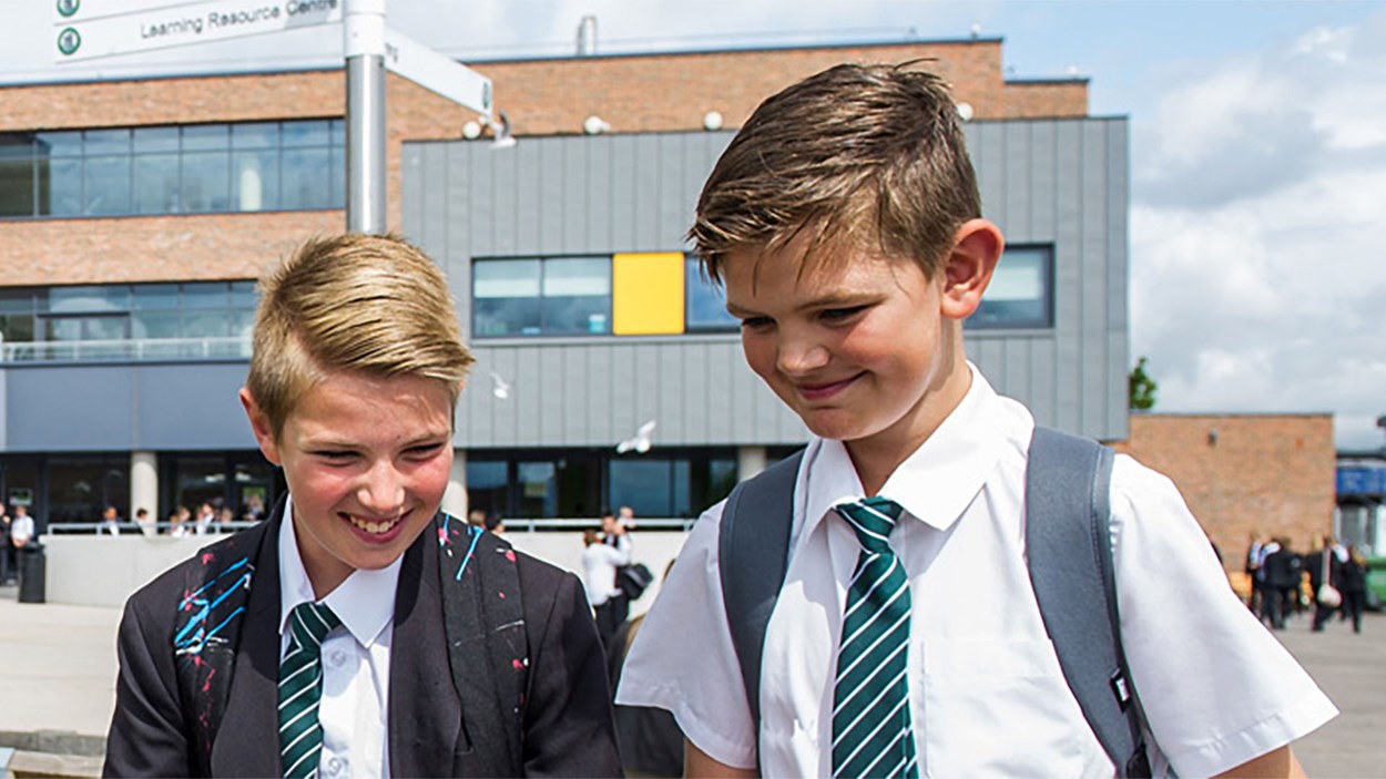 Two boys in a school playground