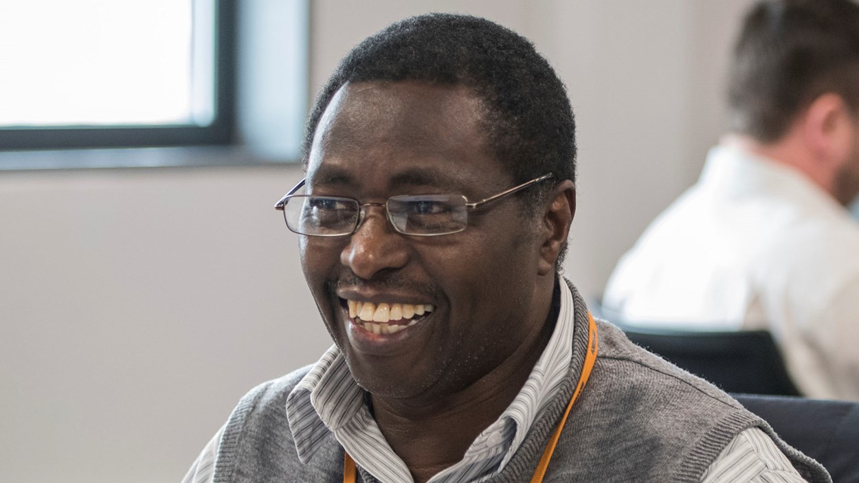 A smiling man in an office